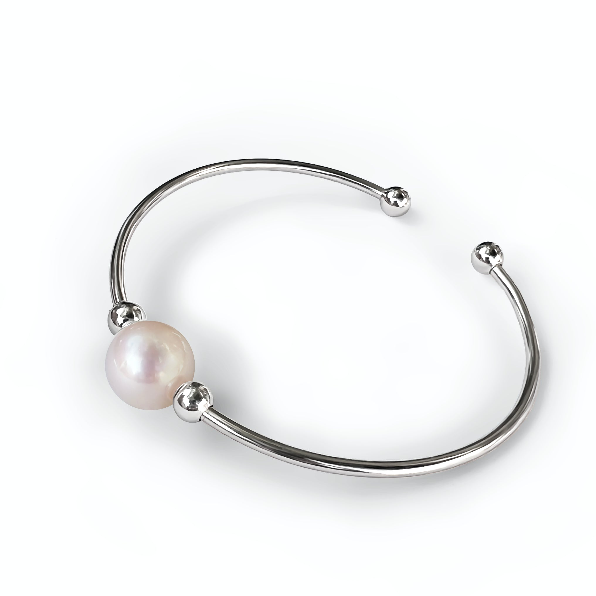 Bracelet  Jonc Astral  en argent 925 avec au centre une perle de culture d'eau douce   blanche diamètre 10 mm  encadrée de  deux petites perles en Argent 925 