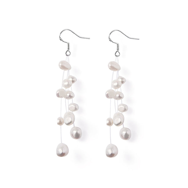 Boucles d’oreilles Constellation perles d’eau douce blanche sur fil de nylon et argent 925.