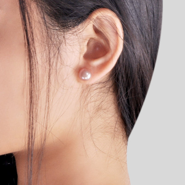 Vue des Boucles d'Oreilles à clou Perles de Cultures d'Eau Douce rose portees monture Argent 925