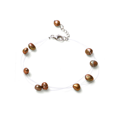 Bracelet constellation perles d'eau douce dorées sur fil de nylon et argent 925