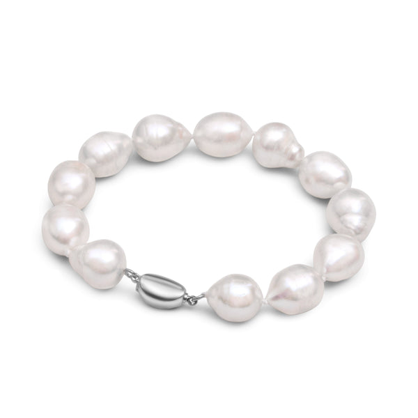 Bracelet riviera tour de poignet de 19cm avec des perles de culture d’eau douce baroques blanche de forme olives de 11mm, et fermoir 925